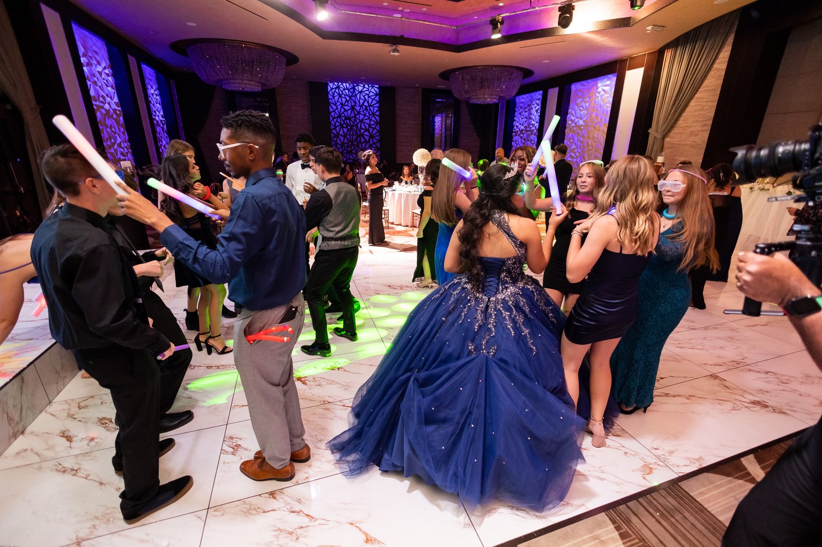 Guests celebrating together on the dance floor